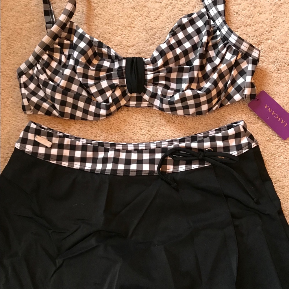 NEW!! Two piece swimsuit with skirted bottom.